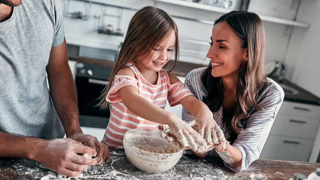 Happy family loves remodeled kitchen cabinets by kitchen cabinet pros